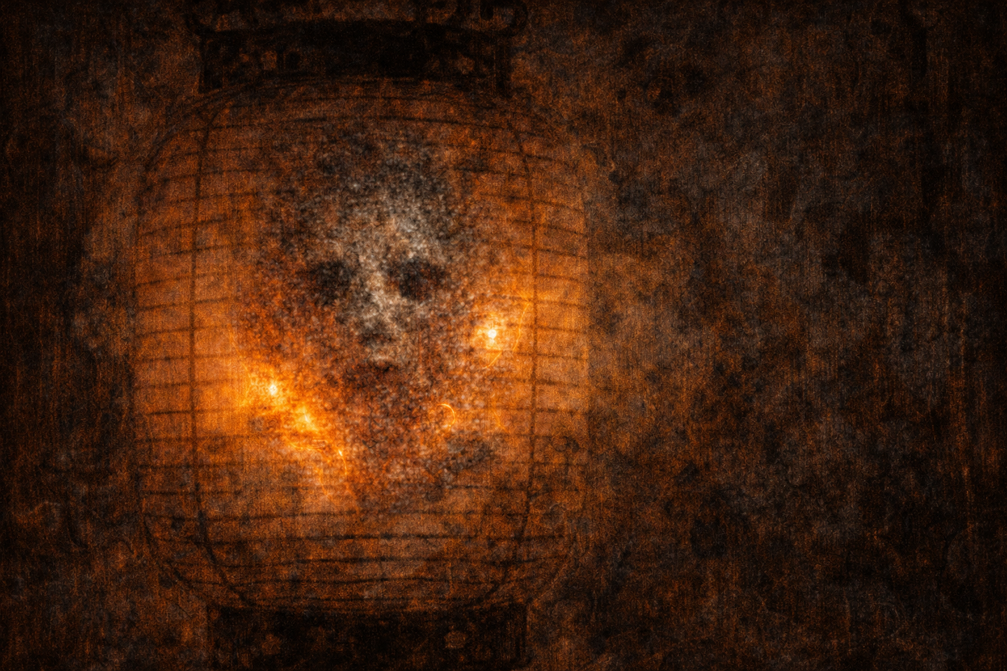 An orange light from a lantern in a dark room, with visible grain-like speckles within the glow and surrounding deep shadows.